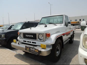 Toyota  Land Cruiser  LX  1988  Manual  300,000 Km  6 Cylinder  Four Wheel Drive (4WD)  Pick Up  Off White