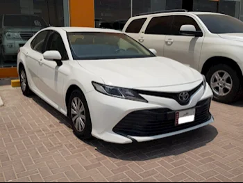 Toyota  Camry  LE  2019  Automatic  39٬000 Km  4 Cylinder  Front Wheel Drive (FWD)  Sedan  White