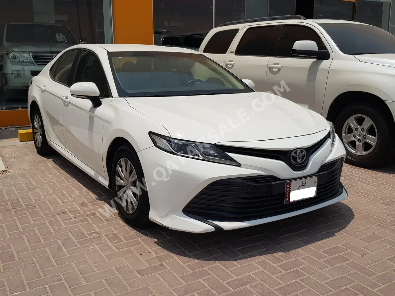 Toyota  Camry  LE  2019  Automatic  39٬000 Km  4 Cylinder  Front Wheel Drive (FWD)  Sedan  White