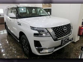 Nissan  Patrol  Titanium  2024  Automatic  0 Km  6 Cylinder  Four Wheel Drive (4WD)  SUV  White  With Warranty