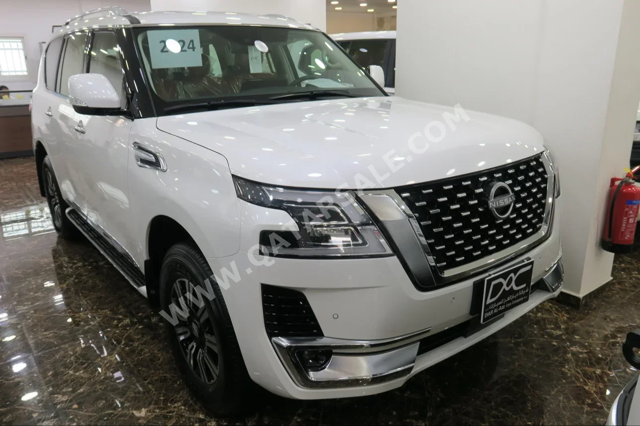 Nissan  Patrol  Titanium  2024  Automatic  0 Km  6 Cylinder  Four Wheel Drive (4WD)  SUV  White  With Warranty