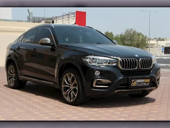  BMW  X-Series  X6 50i  2016  Automatic  100,000 Km  8 Cylinder  Four Wheel Drive (4WD)  SUV  Black  With Warranty