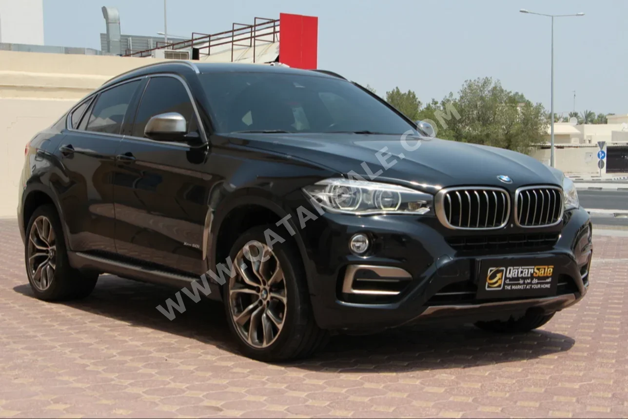  BMW  X-Series  X6 50i  2016  Automatic  100,000 Km  8 Cylinder  Four Wheel Drive (4WD)  SUV  Black  With Warranty