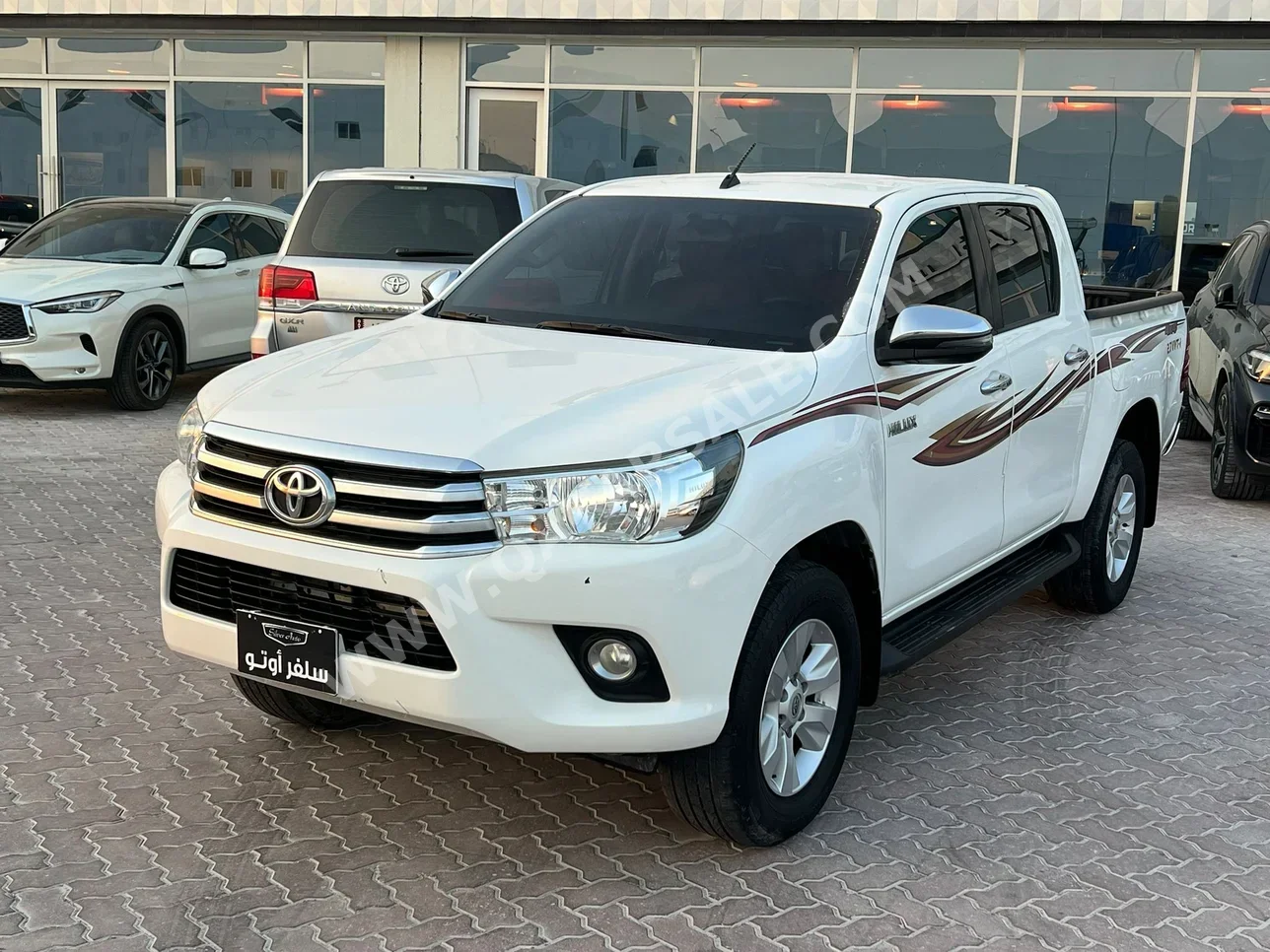 Toyota  Hilux  SR5  2018  Automatic  326,000 Km  4 Cylinder  Four Wheel Drive (4WD)  Pick Up  White