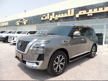 Nissan  Patrol  Titanium  2023  Automatic  10,000 Km  8 Cylinder  Four Wheel Drive (4WD)  SUV  Gray