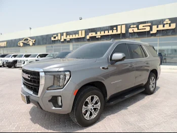 GMC  Yukon  SLE  2022  Automatic  83,000 Km  8 Cylinder  Rear Wheel Drive (RWD)  SUV  Gray  With Warranty