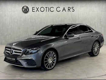 مرسيدس - بنز  اي - كلاس  400 AMG  2017  اوتوماتيك  97,000 كم  6 سلندر  دفع خلفي  سيدان  رمادي