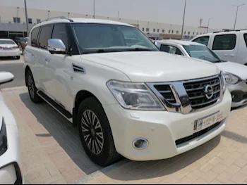 Nissan  Patrol  Platinum  2015  Automatic  212,000 Km  8 Cylinder  Four Wheel Drive (4WD)  SUV  White