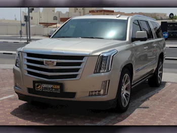 Cadillac  Escalade  2016  Automatic  122,000 Km  8 Cylinder  Four Wheel Drive (4WD)  SUV  Gold