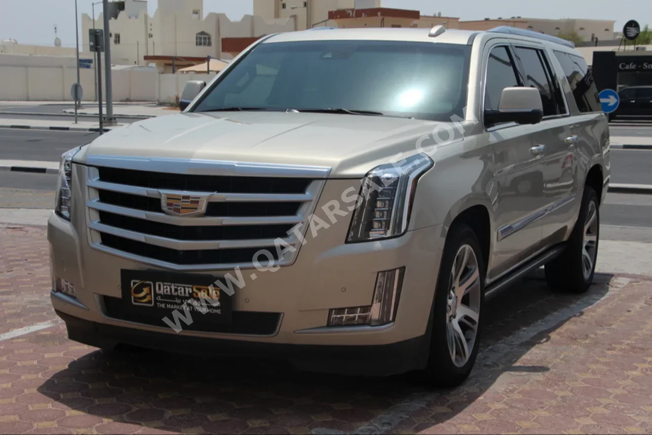 Cadillac  Escalade  2016  Automatic  122,000 Km  8 Cylinder  Four Wheel Drive (4WD)  SUV  Gold