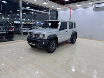 Suzuki  Jimny  2024  Automatic  4,900 Km  4 Cylinder  Four Wheel Drive (4WD)  SUV  Silver  With Warranty