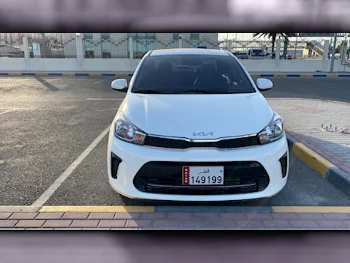 Kia  Pegas  4 Cylinder  Sedan  White  2023