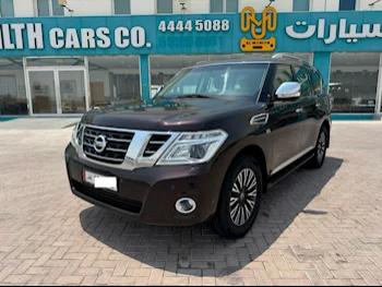 Nissan  Patrol  Platinum  2015  Automatic  247,000 Km  8 Cylinder  Four Wheel Drive (4WD)  SUV  Maroon