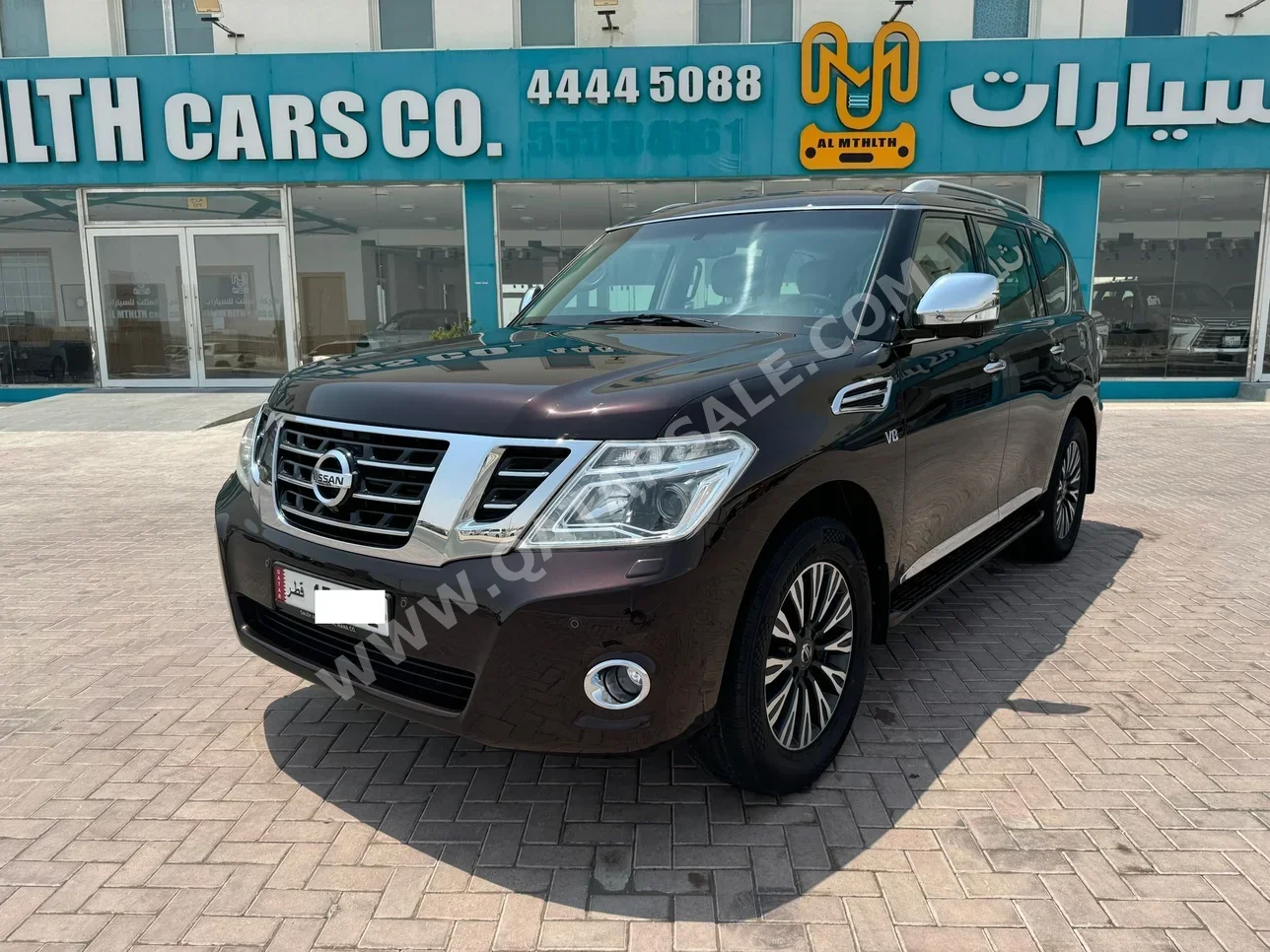 Nissan  Patrol  Platinum  2015  Automatic  247,000 Km  8 Cylinder  Four Wheel Drive (4WD)  SUV  Maroon