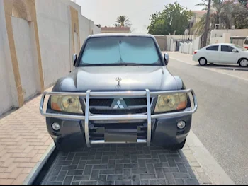 Mitsubishi  Pajero  GLS  2006  Automatic  218,800 Km  6 Cylinder  Four Wheel Drive (4WD)  SUV  Blue and Gray