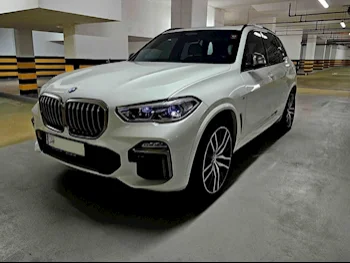 BMW  X-Series  X5 M50i  2020  Automatic  58,000 Km  8 Cylinder  All Wheel Drive (AWD)  SUV  White  With Warranty