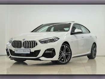 BMW  2-Series  218i  2021  Automatic  50,900 Km  3 Cylinder  Front Wheel Drive (FWD)  Sedan  White  With Warranty