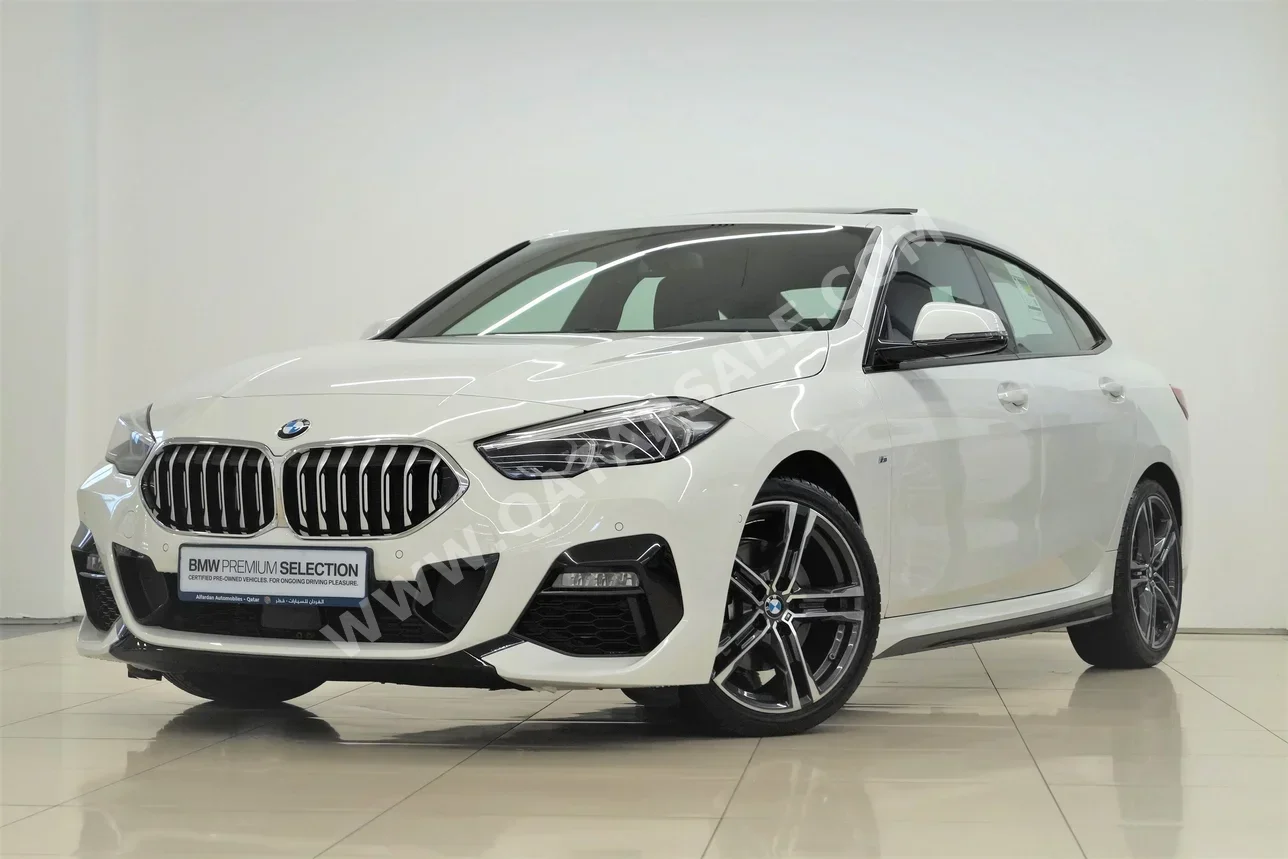 BMW  2-Series  218i  2021  Automatic  50,900 Km  3 Cylinder  Front Wheel Drive (FWD)  Sedan  White  With Warranty