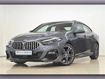 BMW  2-Series  218i  2021  Automatic  42,750 Km  3 Cylinder  Front Wheel Drive (FWD)  Sedan  Gray  With Warranty