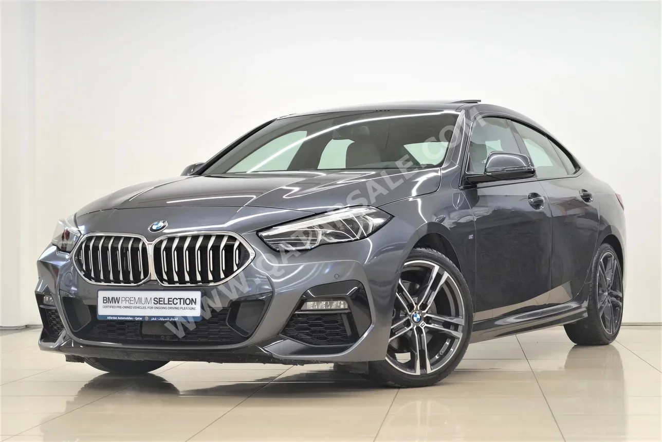 BMW  2-Series  218i  2021  Automatic  42,750 Km  3 Cylinder  Front Wheel Drive (FWD)  Sedan  Gray  With Warranty