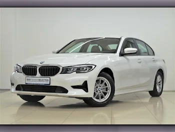 BMW  3-Series  320i  2021  Automatic  40,800 Km  4 Cylinder  Rear Wheel Drive (RWD)  Sedan  White  With Warranty