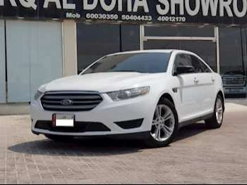 Ford  Taurus  2015  Automatic  131,000 Km  6 Cylinder  Rear Wheel Drive (RWD)  Sedan  White