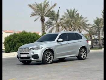 BMW  X-Series  X5  2014  Automatic  147٬000 Km  8 Cylinder  Four Wheel Drive (4WD)  SUV  Silver