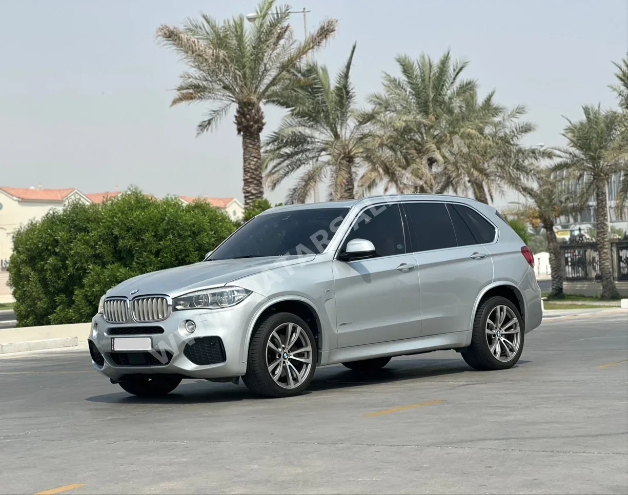 BMW  X-Series  X5  2014  Automatic  147٬000 Km  8 Cylinder  Four Wheel Drive (4WD)  SUV  Silver