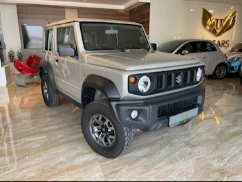 Suzuki  Jimny  2021  Automatic  57,000 Km  4 Cylinder  Four Wheel Drive (4WD)  SUV  Silver  With Warranty