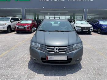 Honda  City  2010  Automatic  82,000 Km  4 Cylinder  Front Wheel Drive (FWD)  Sedan  Gray