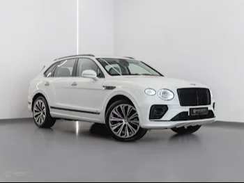 Bentley  Bentayga  2021  Automatic  20,200 Km  8 Cylinder  All Wheel Drive (AWD)  SUV  White