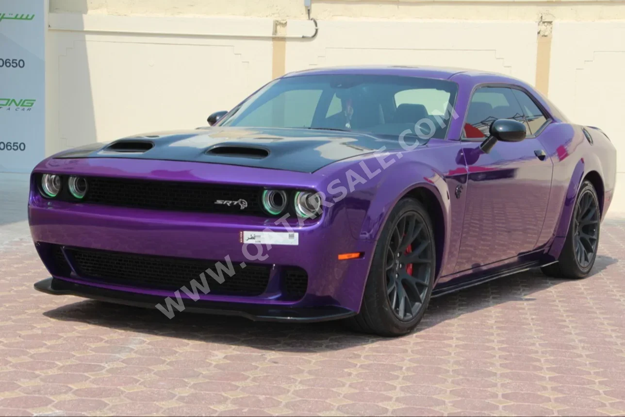  Dodge  Challenger  Hellcat  2016  Automatic  75,600 Km  8 Cylinder  Rear Wheel Drive (RWD)  Coupe / Sport  Purple  With Warranty