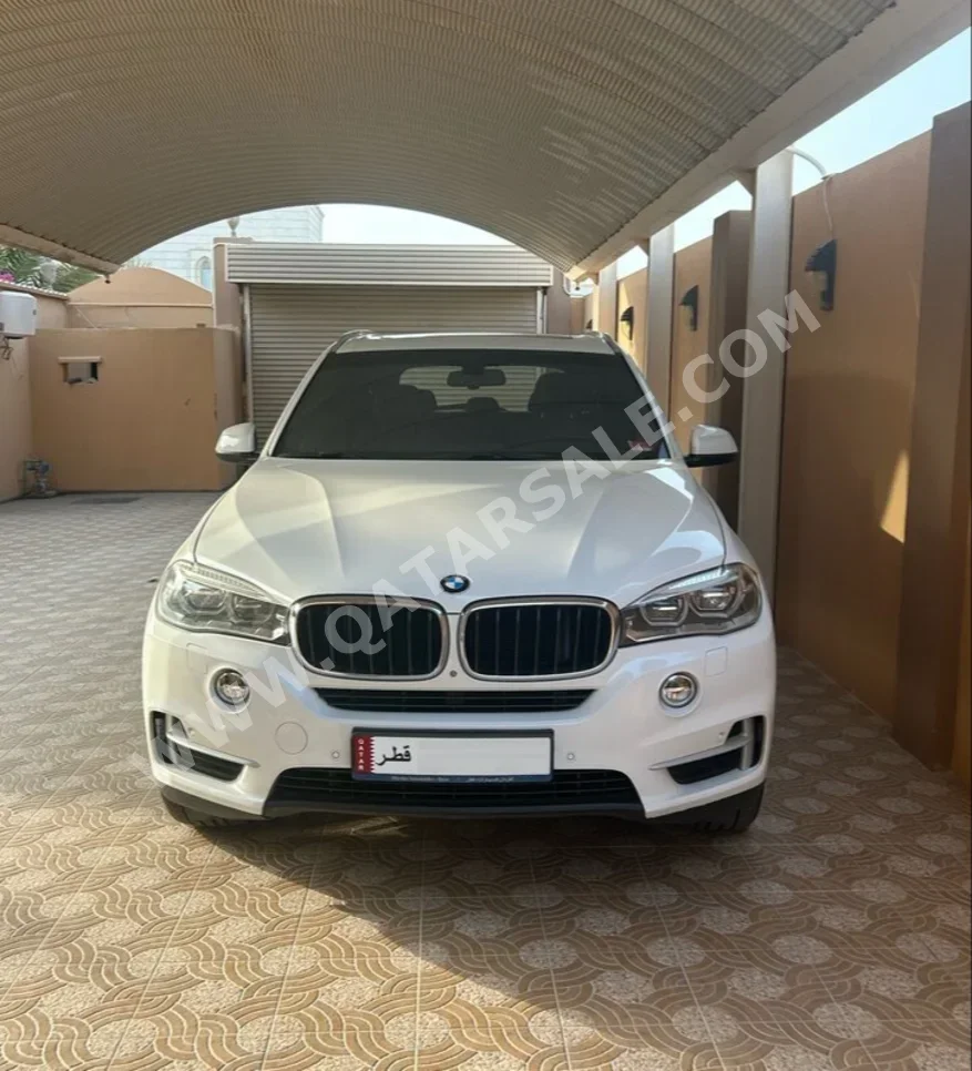 BMW  X-Series  X5  2015  Automatic  133٬817 Km  6 Cylinder  Four Wheel Drive (4WD)  SUV  White