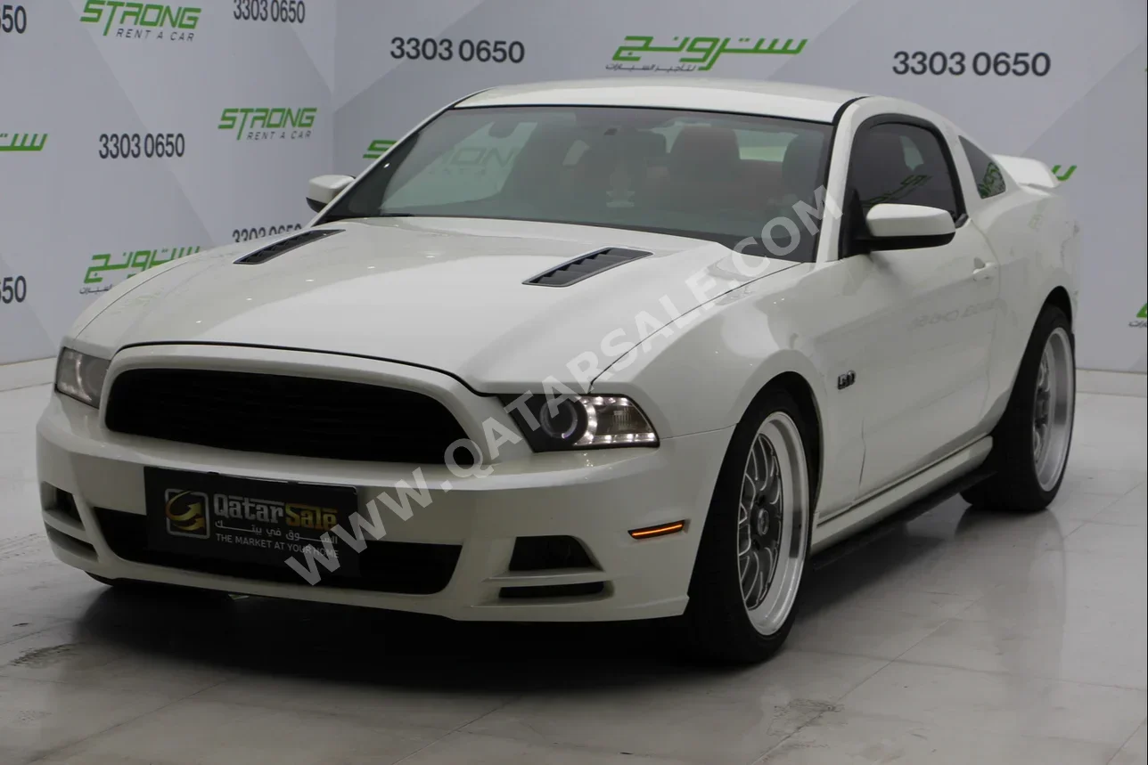 Ford  Mustang  GT  2013  Automatic  293,000 Km  8 Cylinder  Rear Wheel Drive (RWD)  Coupe / Sport  White