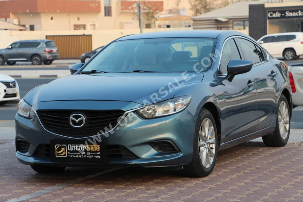 Mazda  Mazda 6  2015  Automatic  133,000 Km  4 Cylinder  Front Wheel Drive (FWD)  Sedan  Blue