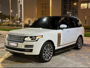  Land Rover  Range Rover  Vogue Super charged  2015  Automatic  105,000 Km  8 Cylinder  Four Wheel Drive (4WD)  SUV  White  With Warranty