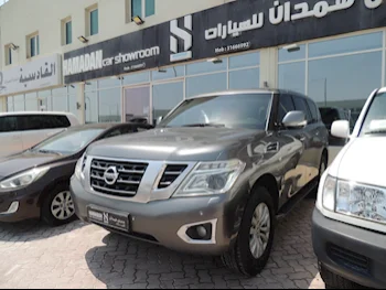 Nissan  Patrol  SE  2015  Automatic  325,000 Km  8 Cylinder  Four Wheel Drive (4WD)  SUV  Gray