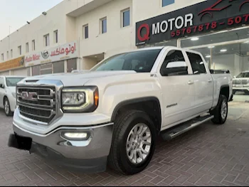 GMC  Sierra  SLE  2018  Automatic  112,000 Km  8 Cylinder  Four Wheel Drive (4WD)  Pick Up  White