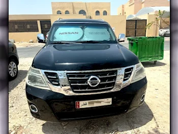 Nissan  Patrol  Platinum  2014  Automatic  99٬000 Km  8 Cylinder  Four Wheel Drive (4WD)  SUV  Black