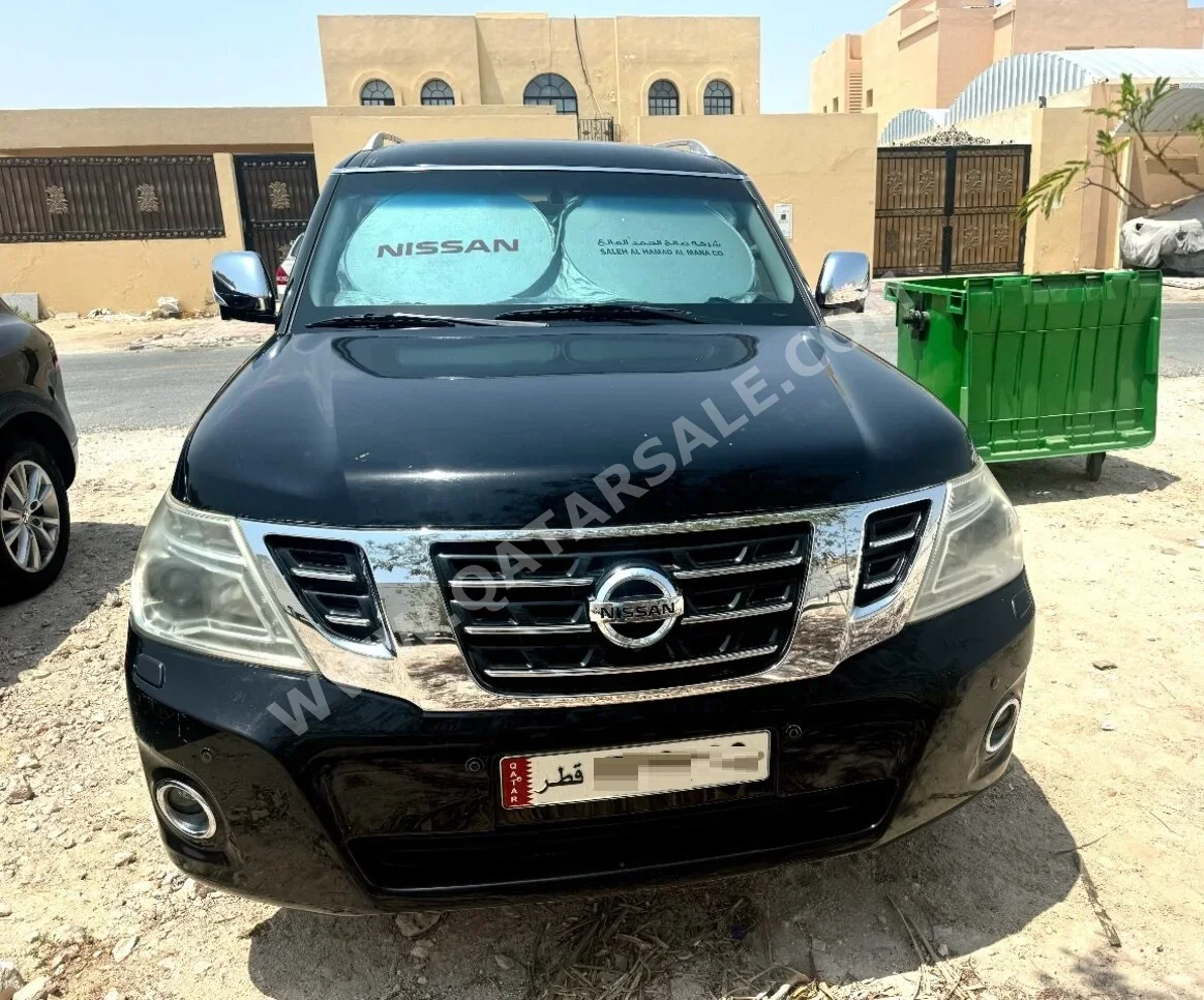 Nissan  Patrol  Platinum  2014  Automatic  99٬000 Km  8 Cylinder  Four Wheel Drive (4WD)  SUV  Black