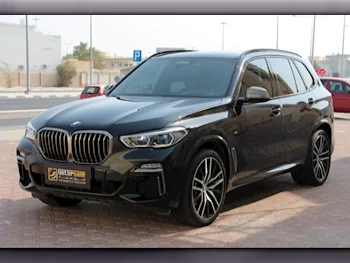 BMW  X-Series  X5 M50i  2020  Automatic  52,000 Km  8 Cylinder  Four Wheel Drive (4WD)  SUV  Black  With Warranty