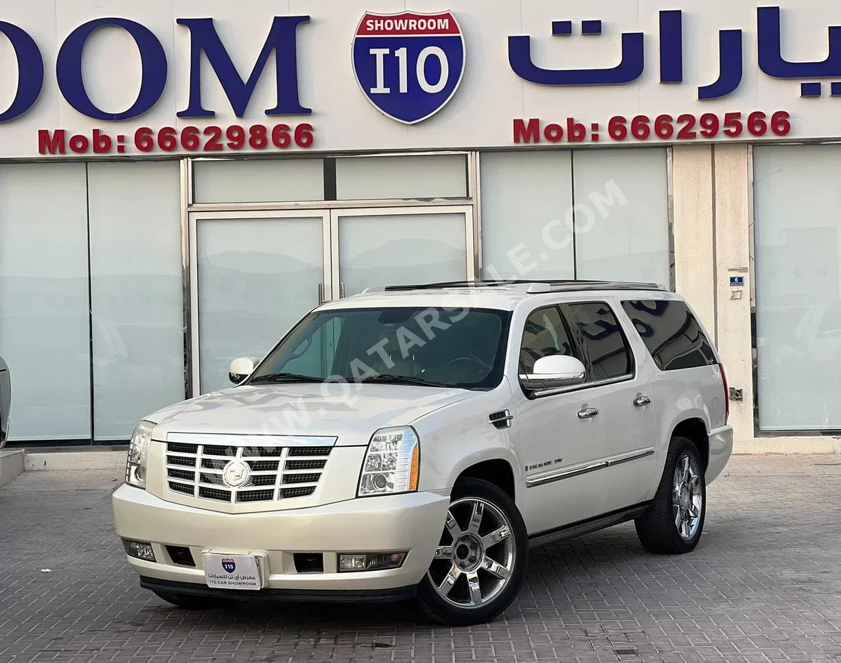 Cadillac  Escalade  2009  Automatic  241,000 Km  8 Cylinder  Four Wheel Drive (4WD)  SUV  White