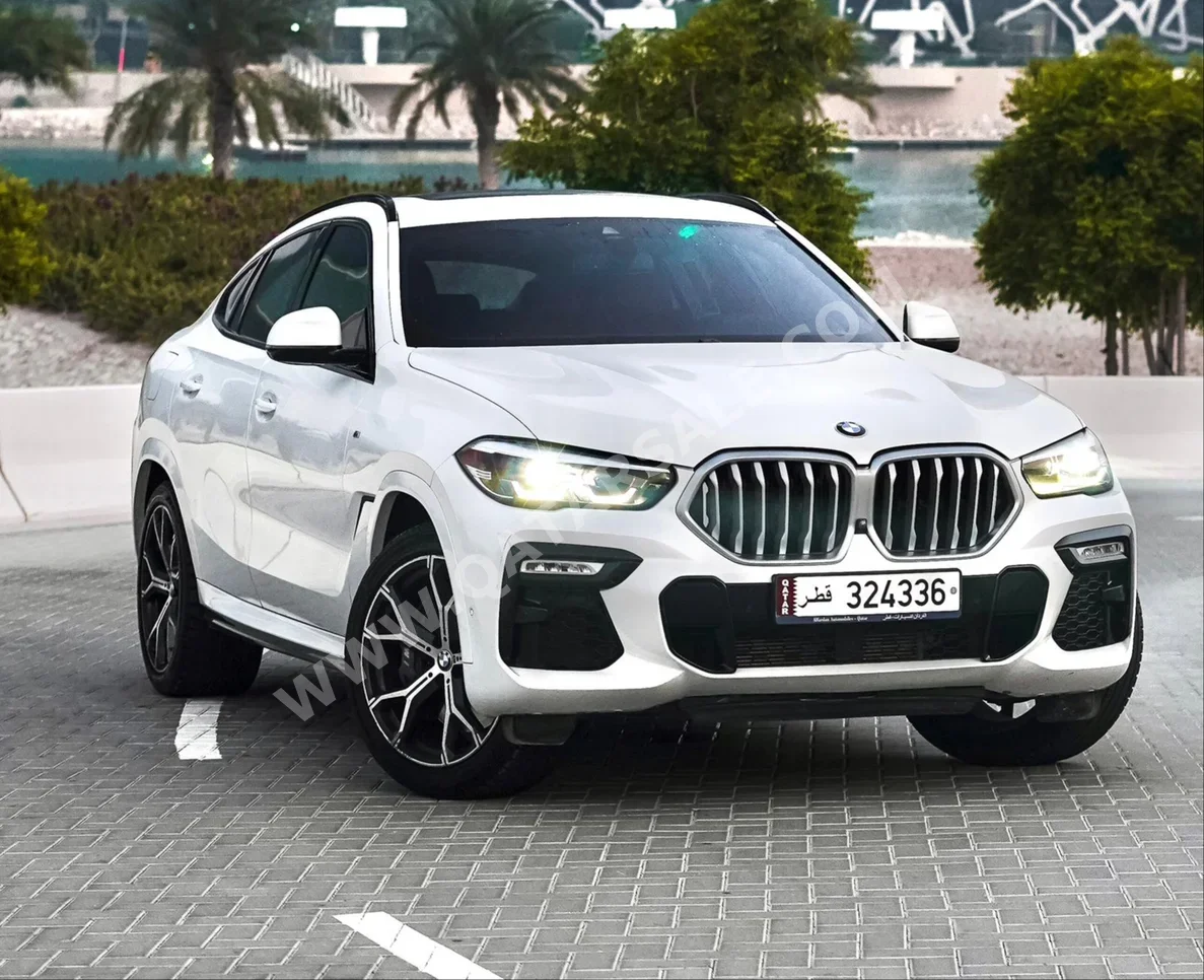 BMW  X-Series  X6  2020  Automatic  45,000 Km  6 Cylinder  Four Wheel Drive (4WD)  SUV  White  With Warranty