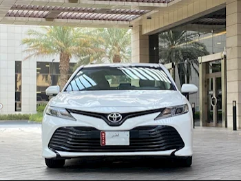 Toyota  Camry  LE  2019  Automatic  82,000 Km  4 Cylinder  Front Wheel Drive (FWD)  Sedan  White