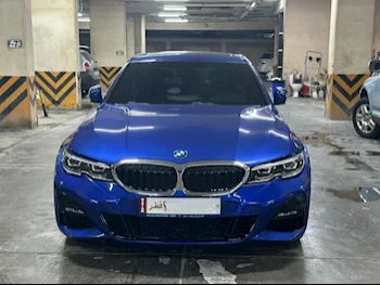 BMW  3-Series  330i  2021  Automatic  34,000 Km  4 Cylinder  Rear Wheel Drive (RWD)  Sedan  Blue  With Warranty