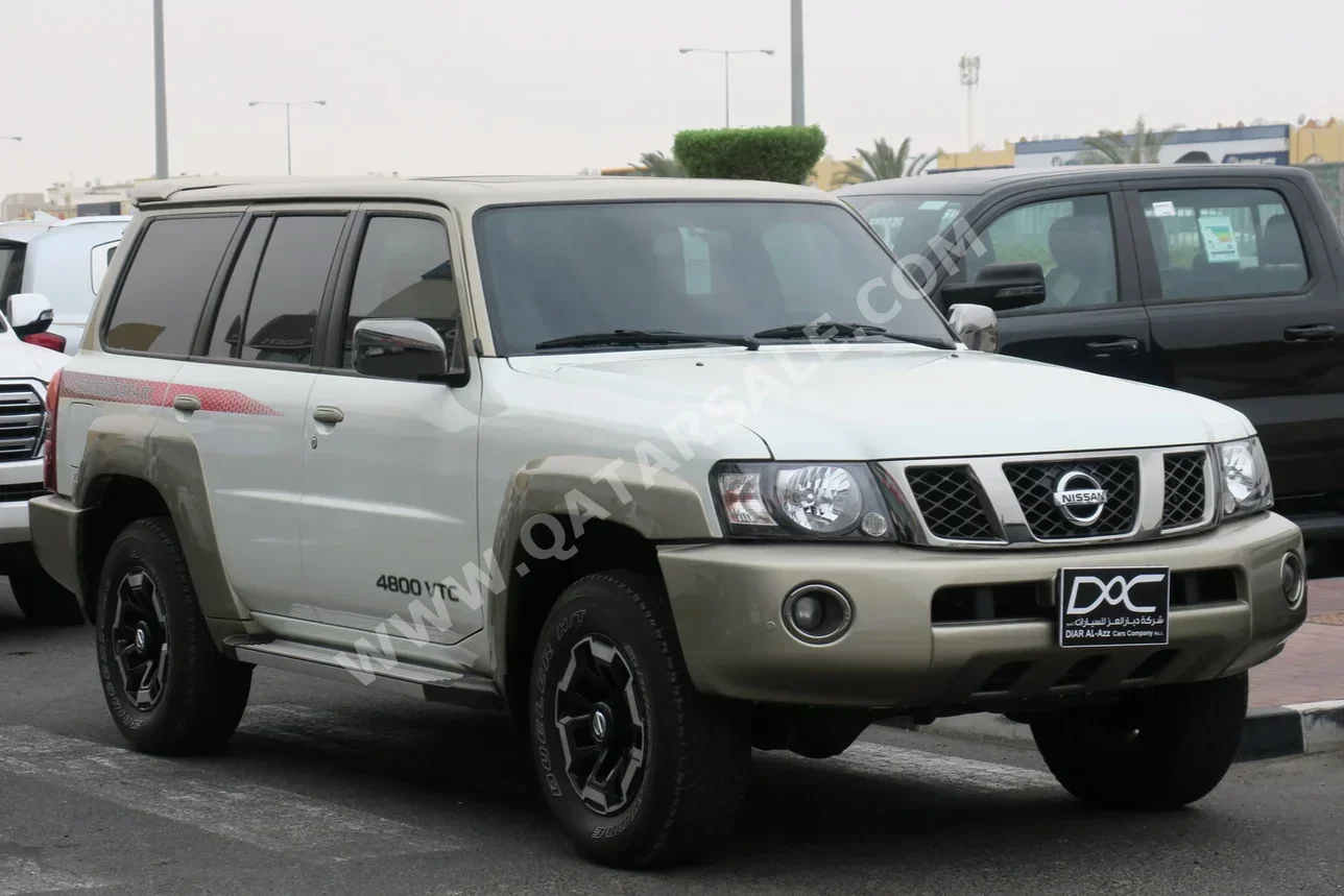 Nissan  Patrol  Super Safari  2021  Automatic  12,000 Km  6 Cylinder  Four Wheel Drive (4WD)  SUV  White  With Warranty