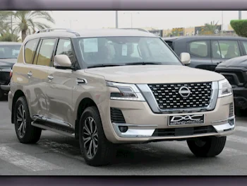 Nissan  Patrol  Titanium  2022  Automatic  39٬000 Km  6 Cylinder  Four Wheel Drive (4WD)  SUV  Gold  With Warranty