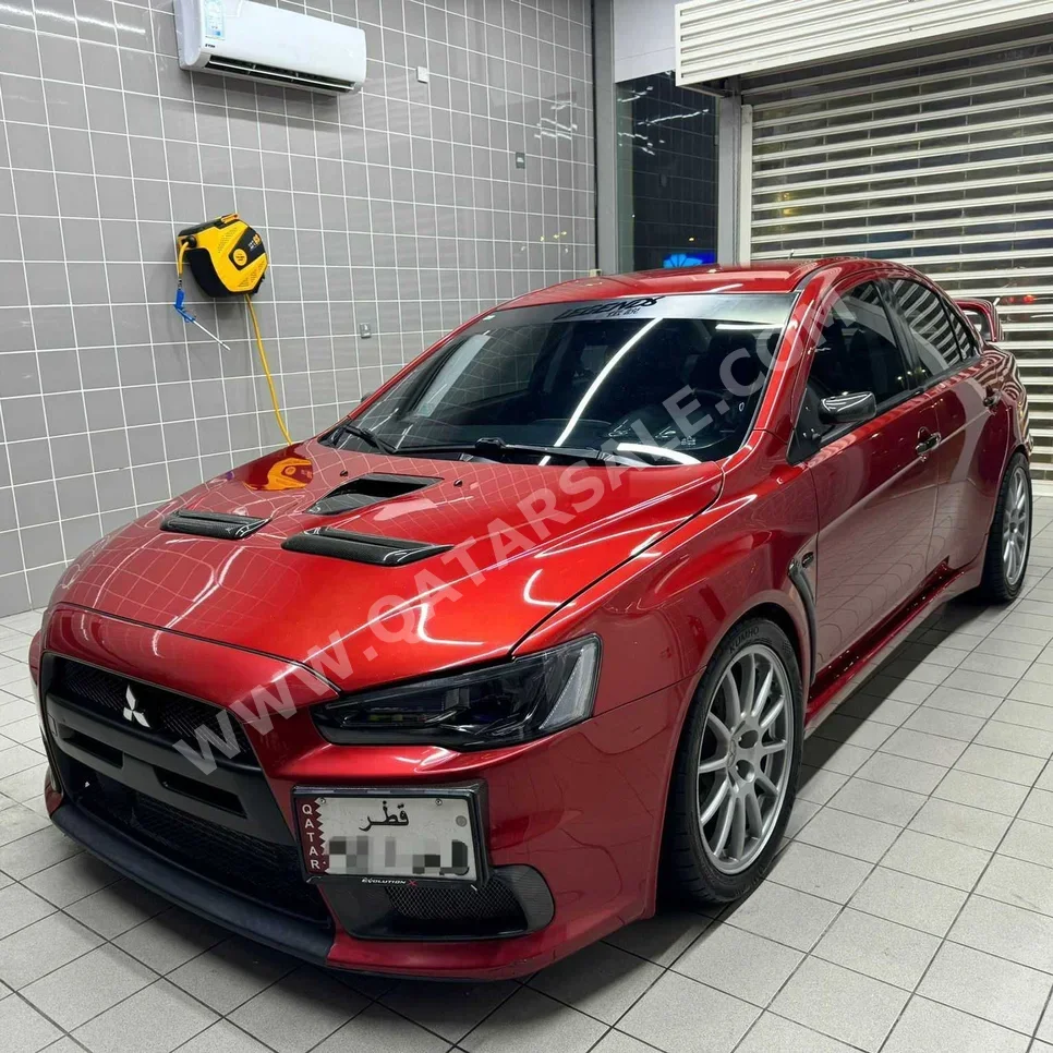 Mitsubishi  Lancer  Evolution-10  2008  Manual  83,000 Km  4 Cylinder  All Wheel Drive (AWD)  Sedan  Red