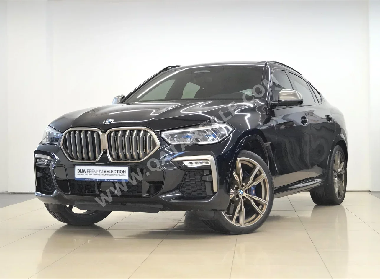 BMW  X-Series  X6 M50i  2020  Automatic  48,600 Km  8 Cylinder  Four Wheel Drive (4WD)  SUV  Black  With Warranty