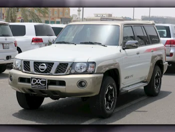 Nissan  Patrol  Super Safari  2021  Automatic  12,000 Km  6 Cylinder  Four Wheel Drive (4WD)  SUV  White  With Warranty